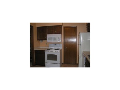 Kitchen. new stove, dishwasher and microwave.  Wal
