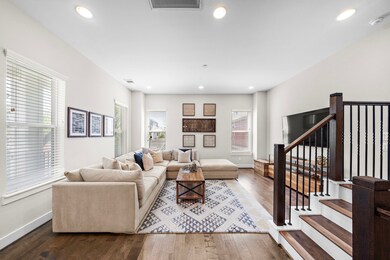 Oversized living room with soaring ceilings.