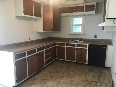 Kitchen with skylight. Just a little TLC needed. N