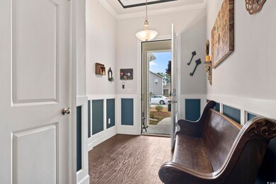 Interior space with dark hardwood / wood-style flo