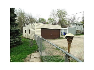 Garage. 2 stall detached with alley access and par
