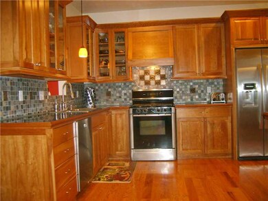 Kitchen. Cherry cabinets, black galaxie & slate ba