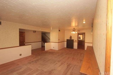 Stairs to the left, Kitchen to right