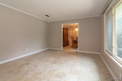 Living Room with view into Formal Dining Room