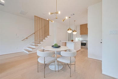 Stunning stairway with custom wood screen.