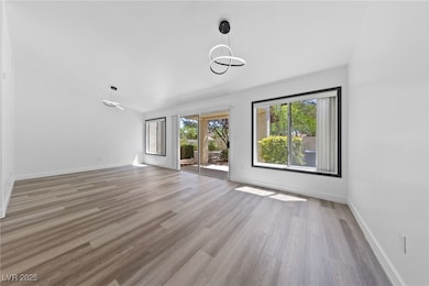 Unfurnished living room with baseboards and luxury