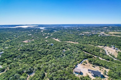 Drone / aerial view of a heavily wooded area