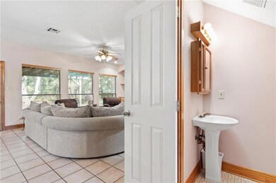 Half bath is in the foyer.