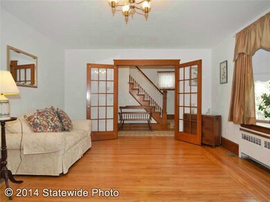 Living Room. Glass French Doors off entry..