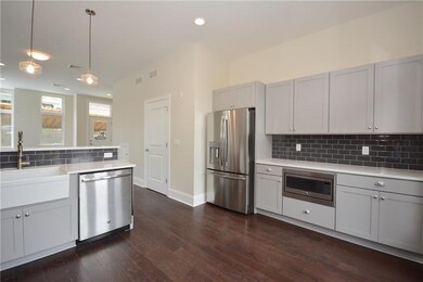 Kitchen picture may be for a different unit, but s