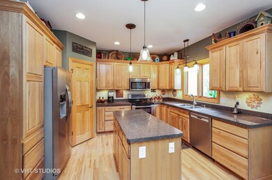 Kitchen has solid hardwood cabinetry, stainless st