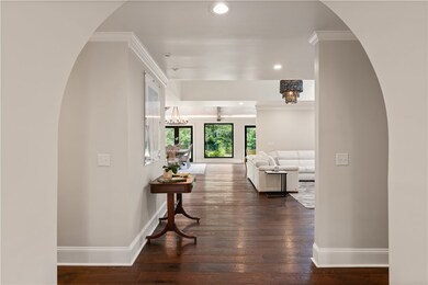 Entrance looking into Family room, Kitchen and Din