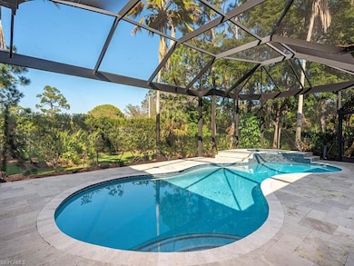 View of swimming pool with a lanai, an in ground h