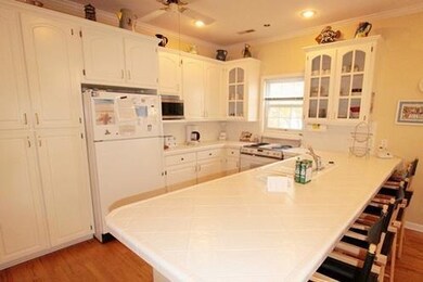 Kitchen showing Center Island and Barsto