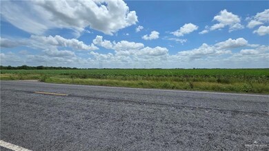 View of asphalt street with a view of countryside