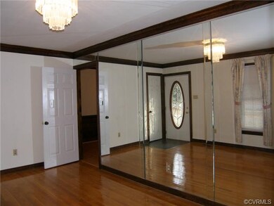 Another View of the Living Room and Front Door
