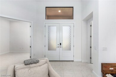 Front entry with den / study to the left.