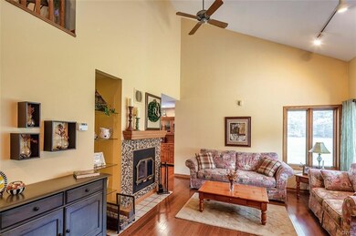 Living room has a gas fireplace.