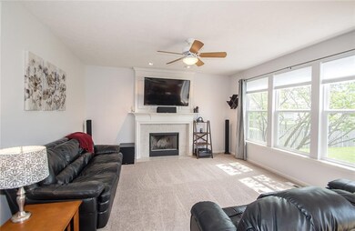 Spacious Family Room with fireplace is great for entertaining! Look at all that natural light!!!