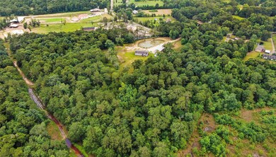 A 9.998 Acre Property complete with an 1,800 sq ft home, a 30'x50' Workshop & a 24x26' Barn.  3/4 of the acreage is fenced.