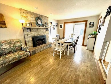 Spacious dining area with stone gas fireplace!