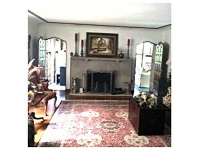 Living Room. Original Hardwood as pictured. Staine