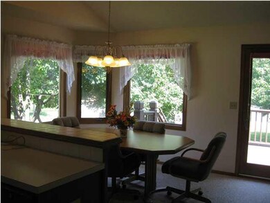 Dining Room opens to kitchen and deck.