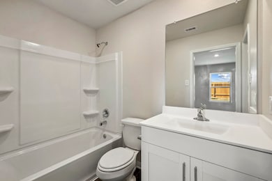 Primary Bathroom comes with a shower and tub combo