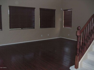 Family room with cherry wood laminate