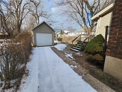 Off street parking with a garage.