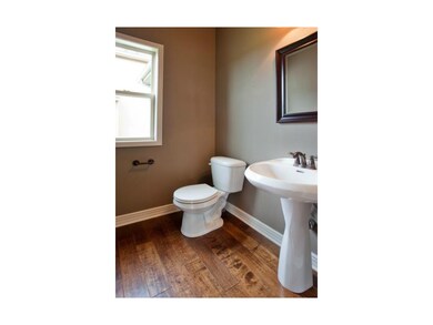 Main level bathroom includes Delta Windemere oil r
