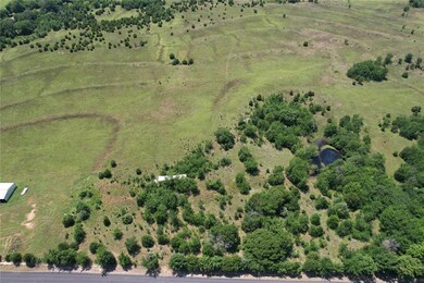 Aerial view of property's location featuring rural landscape