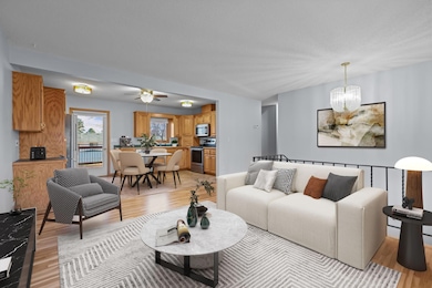 Virtually staged living room, dining, kitchen