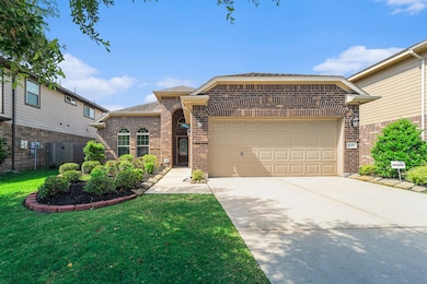 Charming brick exterior with a welcoming entryway,