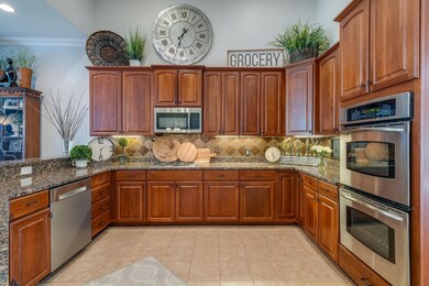 Generous Kitchen Space with room on the Counter tops to create your favorite meals. The vaulted ceiling allows for your creative displays above the cabinets. 