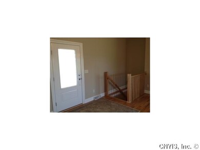 Foyer Prior Model, finished staircase to basement