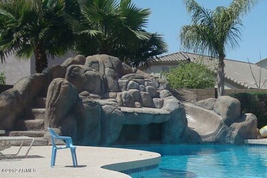 Pool and rock slide waterfall