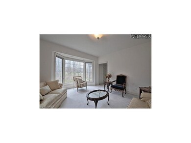 Formal living room with bay window