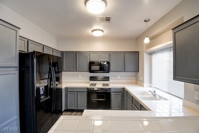 6901 Squaw Mountain Dr unit 202, Las Vegas, NV 89130 - photo 7
