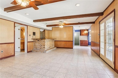 DEN WITH VIEW OF BRICK WETBAR