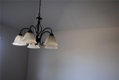Oil rubbed bronze fixtures are featured throughout