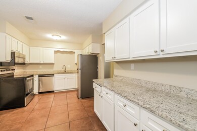 Kitchen featuring sink, stainless steel appliances