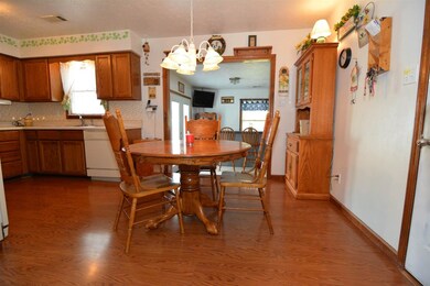 Eat-in kitchen opens to living room and family roo
