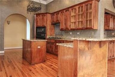 The open concept kitchen allows the chef to visit 
