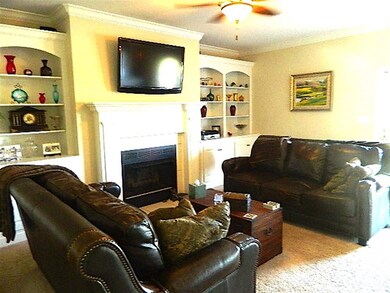 Built-in's and French doors lead to relaxing outdo