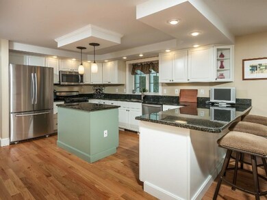 The home has gleaming hardwood...