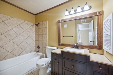 Primary bathroom-nicely appointed vanity, tile acc