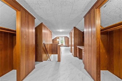 Upstairs finished bedroom not counted in total square footage.