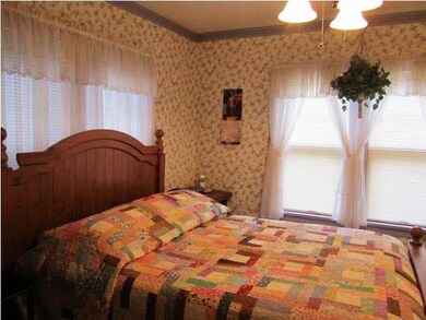 Spacious master bedroom with great windows