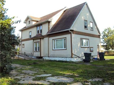 Exterior Back. PHOTO TAKEN FROM IN FRONT OF GARAGE